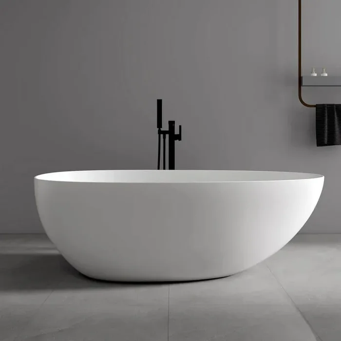 Verna 67 in. x 33 in. Stone Resin Freestanding Soaking Bathtub in White